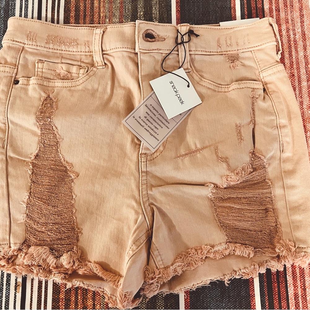 Pretty in peach distressed high rise cutoffs